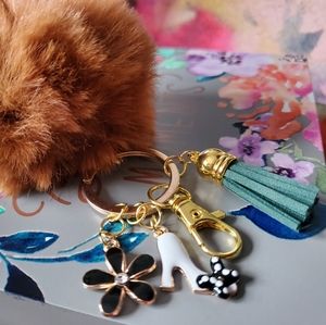 Pom Pom keychain with charms and tassle